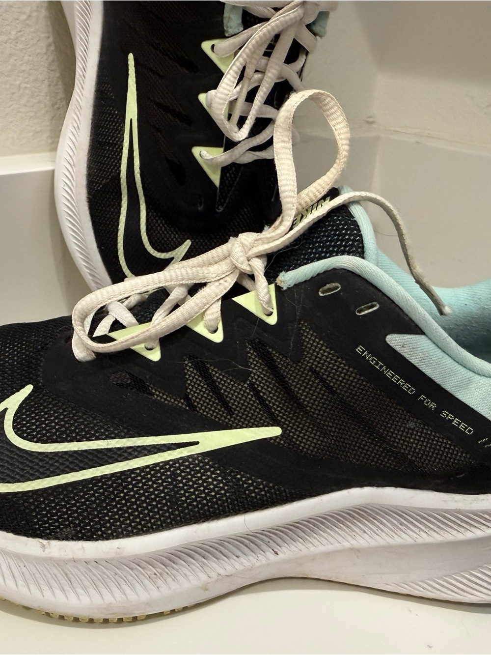 Nike Women’s Black Running Shoes with Mint Accents